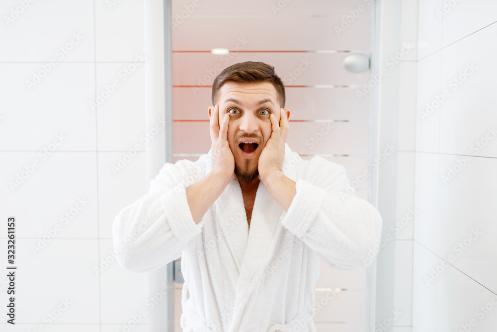 Bearded man frightened by his appearance, hygiene Bearded man frightened by his appearance, hygiene
