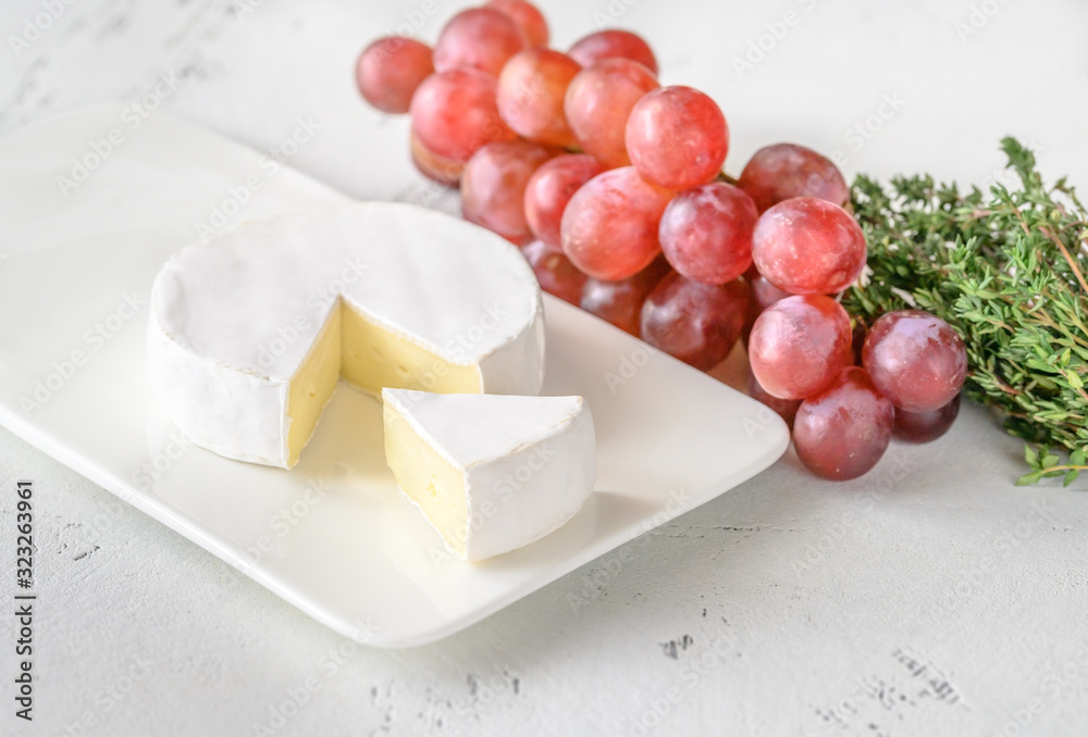 Camembert on the serving plate Camembert on the serving plate