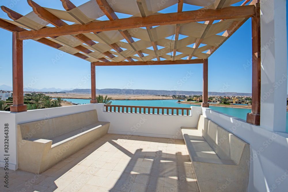 Roof terrace balcony with lagoon view in luxury villa