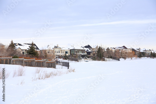 A Perfect Neighborhood along a Frozen River in Canada.