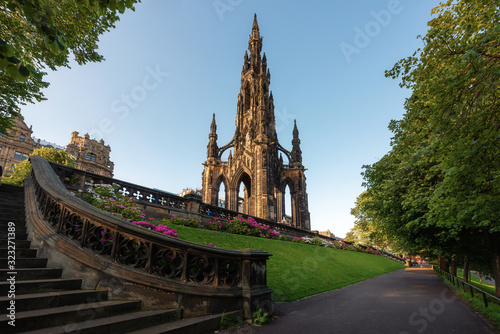 Scott monument in West Princes Street Gardens, Edinburgh during clear blue sky day photo
