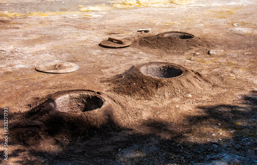 View of the hot springs for geothermal cooking, traditional local meal cooked by volcanic steam, Lagoa das Furnas area, Sao Miguel island, Azores, Portugal photo