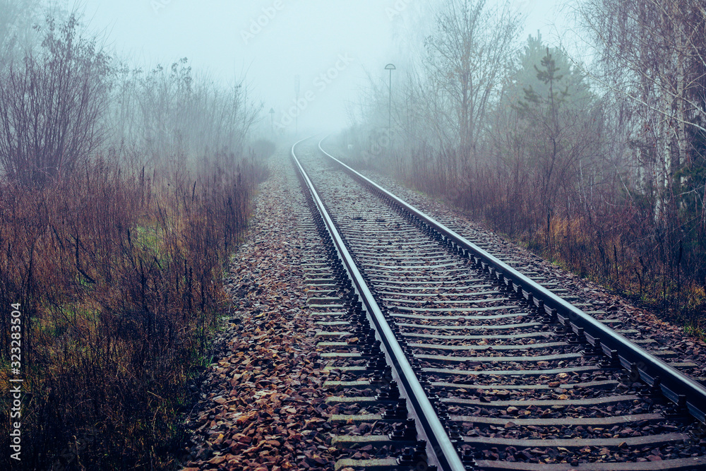 Railway track disappear in fog Railway track disappear in fog