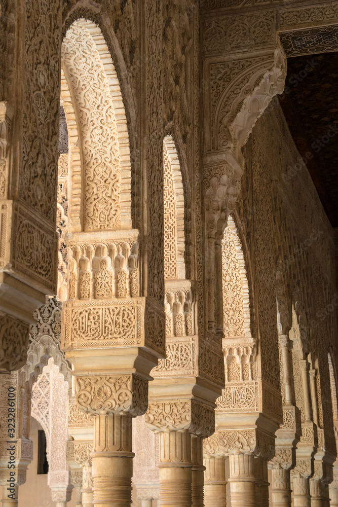 Arabic architectural details in columns and arches of a mosque or an ancient Arab palace