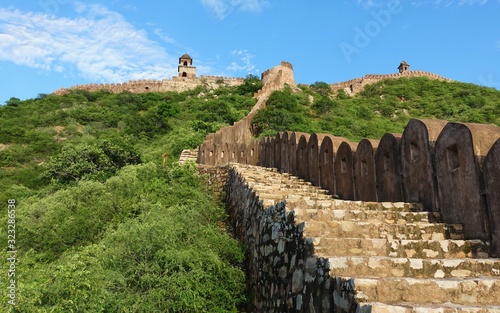 The anciet Great wall of India near Amar Fort in Rajasthan, India photo