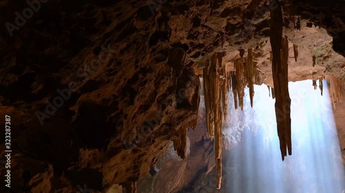 pan and zoom video of Light from the cave. The nature wonderful tourist attraction of Thailand, the place of Khao Luang Cave, Phetchaburi Province. photo