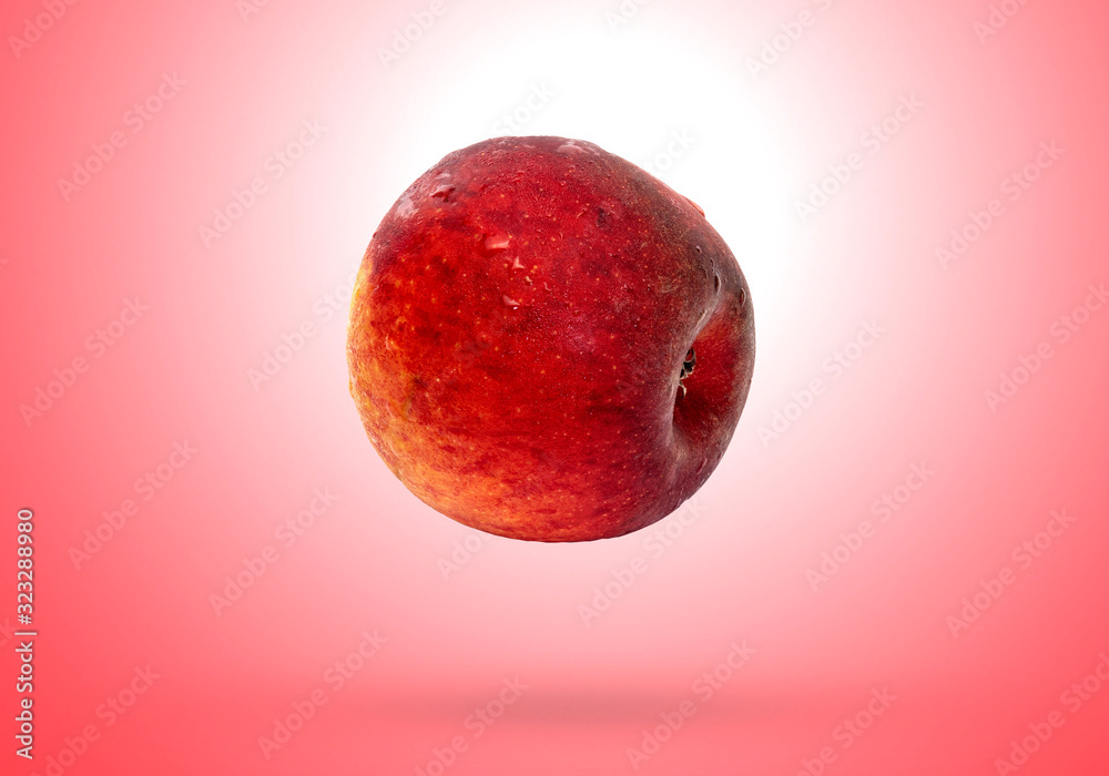 Red Apple isolated on gradients red and white background with clipping path Red Apple isolated on gradients red and white background with clipping path