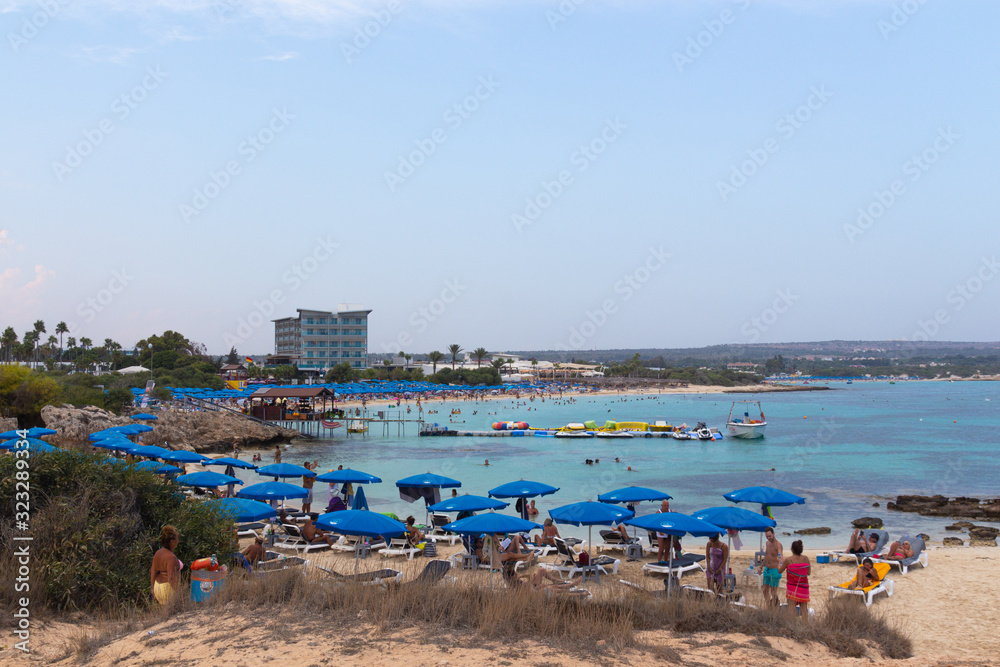 Ayia Napa, Cyprus - September 08, 2019: People are swimming on Makronissos Beach