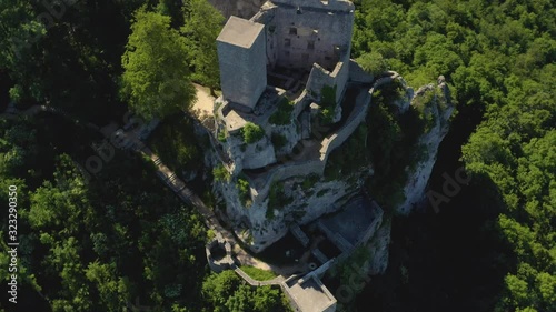 Aerial of Reussenstein Castle in Germany.  Overhead shot. Camera rotates right over the castle ruin.  photo