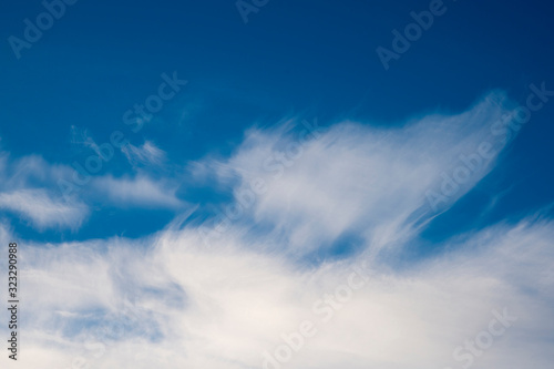 Blue sky with white clouds. Meteorological conditions.