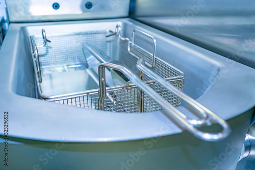 Empty deep fryer. Equipment...