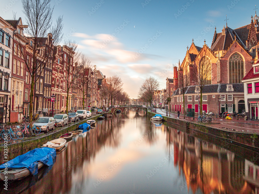 Amsterdam City Canal view with cloudy sky background