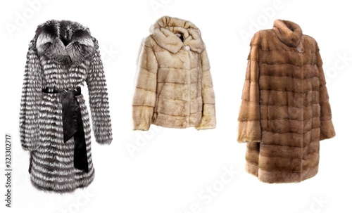 Ornate female fur coat made from mink fur isolated on white background photo