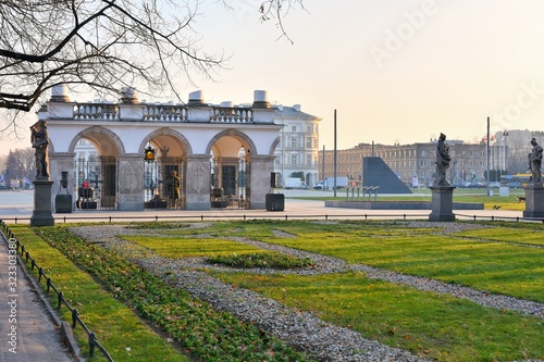 Warsaw, Poland - January 2020. Elegant white colonnade with eternal flame on the tomb of the unknown soldier. Monument in honor of Second World War. View from the Saxon Garden. 