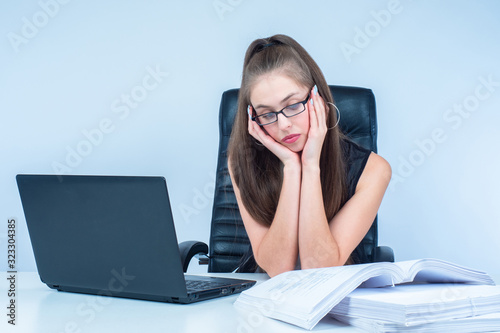 Girl with glasses at the De...
