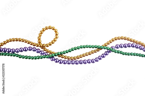Three colors mardi gras beads for decoration isolated ob white background photo