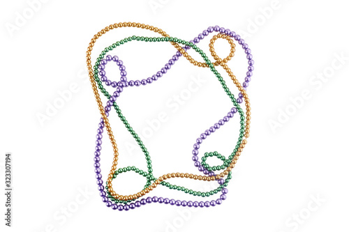 holiday or mardi gras beads making frame isolated on white background photo