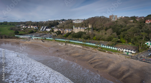Aerial view of the beach chalets at Langland Bay on the Gower peninsula, Swansea, South Wales, UK