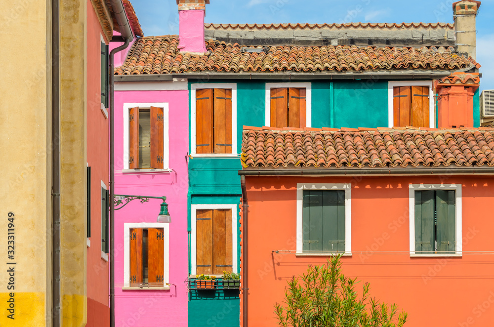 Beautiful window decorated with flowers in Italy