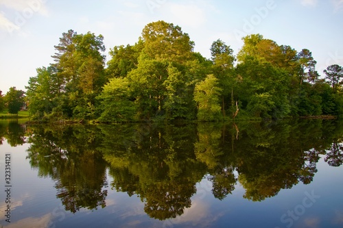 Reflection trees water sky green landscape autumn clouds park outdoors mirror spring view scene