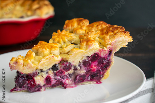 Blueberry Lavender Honey Pie: A slice of blueberry pie flavored with lavender and honey