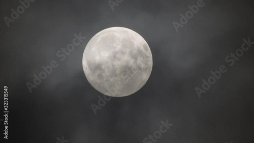 Full moon in the sky with clouds