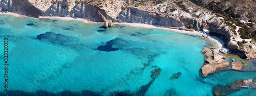 Aerial drone ultra wide photo of famous volcanic beach of Firiplaka in island of Milos, Cyclades, Greece