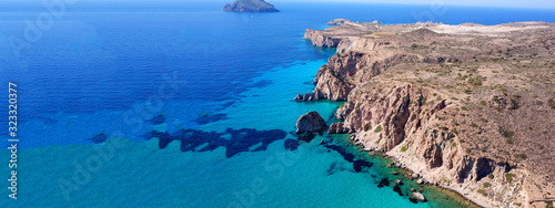 Fototapeta Naklejka Na Ścianę i Meble -  Aerial drone ultra wide photo of famous rocky bay of Plathiena with turquoise beautiful sea, Milos volcanic island, Cyclades, Greece