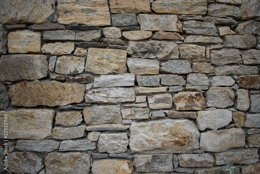 Texture of a stone wall. Old stone wall texture background. Stone wall as a background or texture