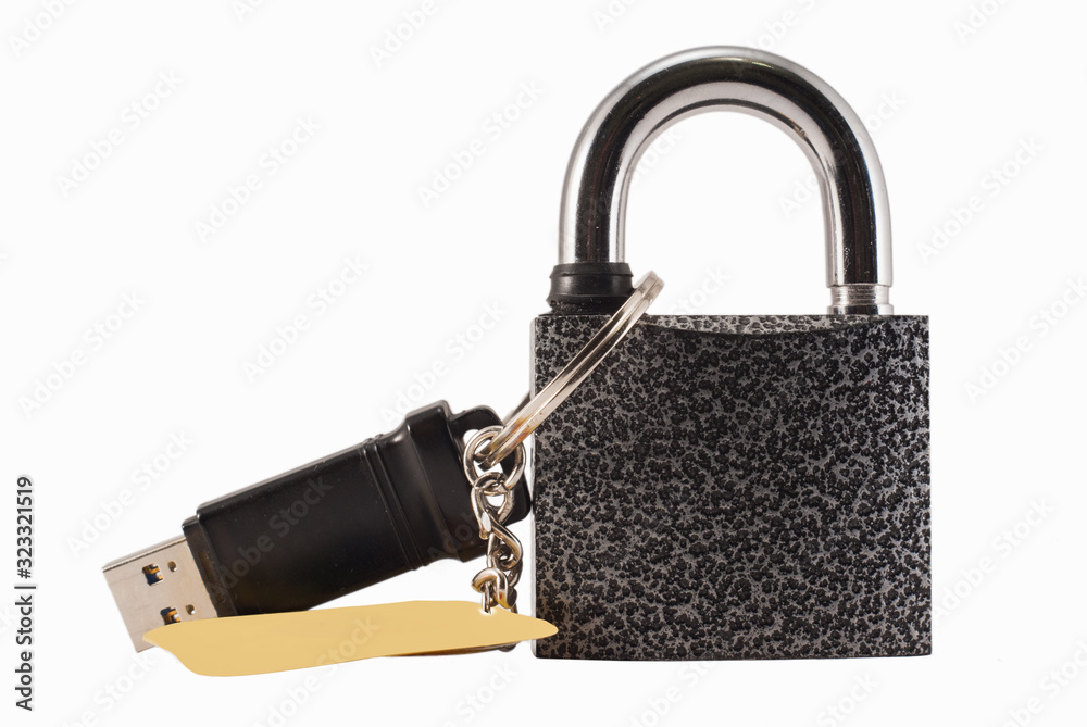 Flash drive and closed lock. Encryption and data security. Flash drive and closed lock. Encryption and data security.
