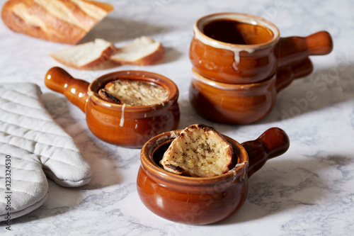 french onion soup bowls on table