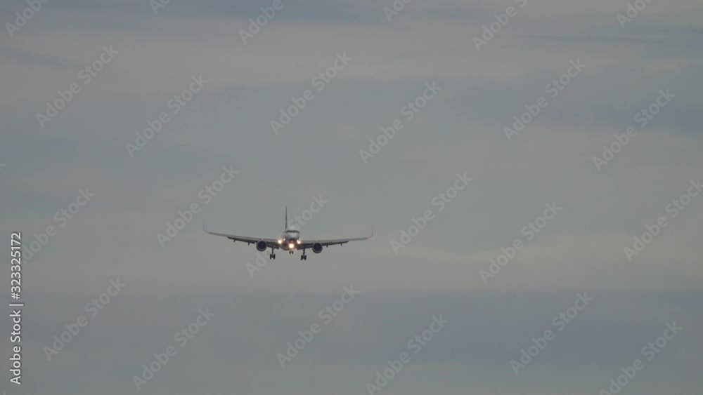 Passenger airplane before landing at morning, 4k Passenger airplane before landing at morning, 4k