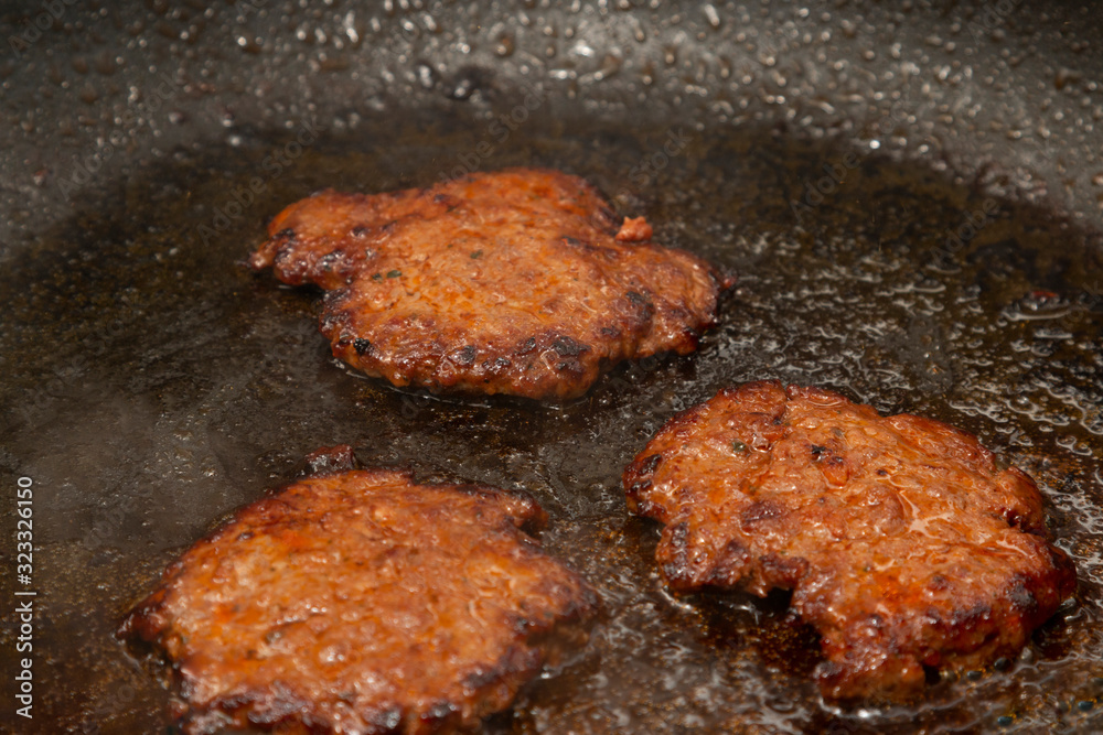 minced meat sizzles in the pan minced meat sizzles in the pan