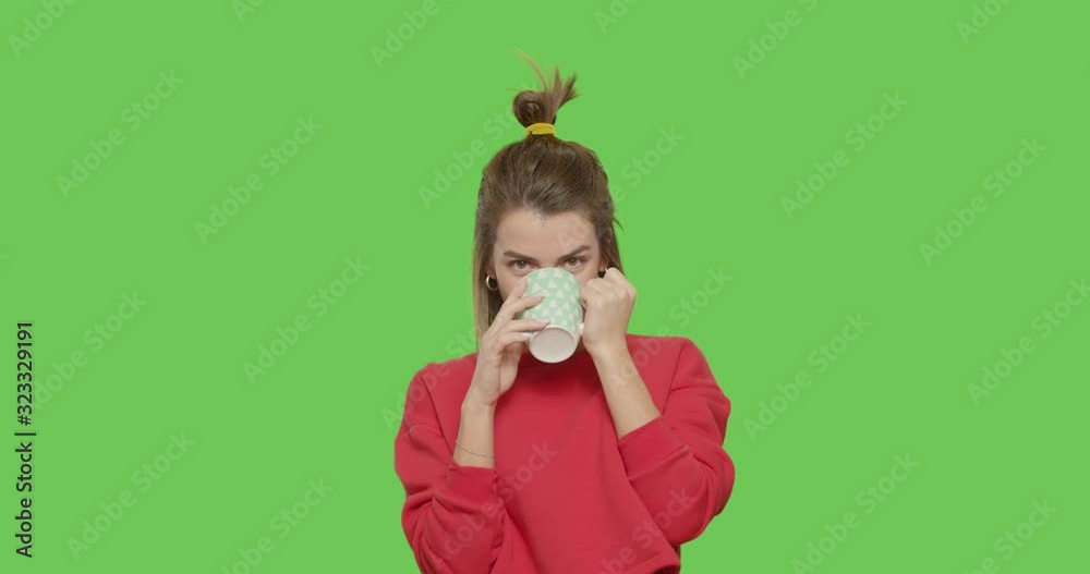 girl drinking coffee isolated on greenscreen girl drinking coffee isolated on greenscreen