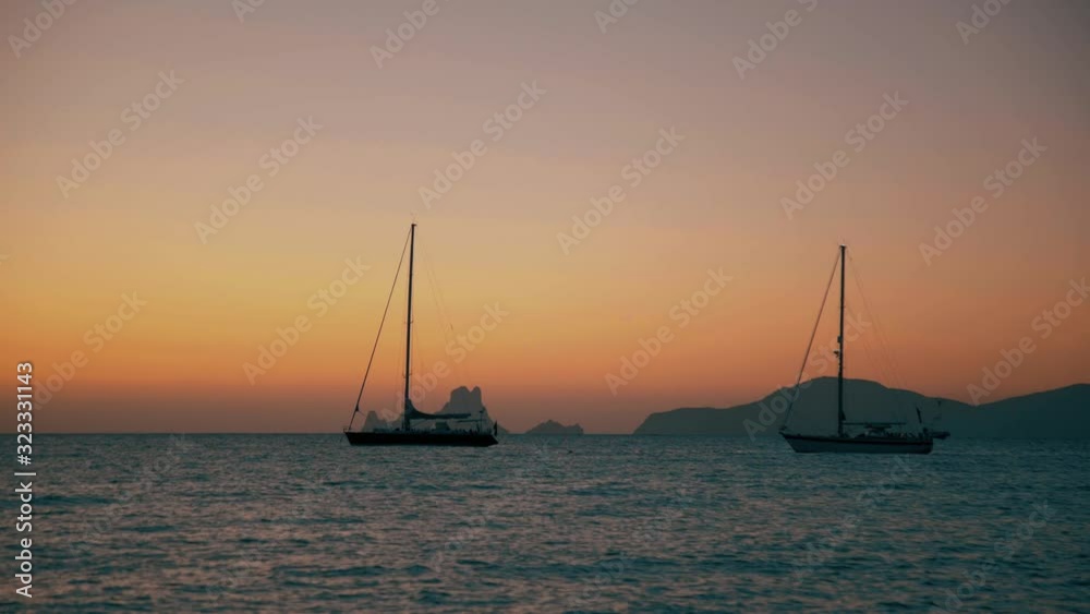 Sailing boats at the sea after the sundown Sailing boats at the sea after the sundown
