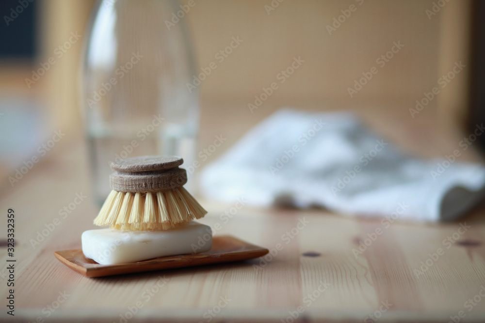 Fotografie Solid soap and compostable dish brush in a zero waste household