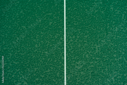 Obraz na płótnie Table Tennis or ping pong rackets and balls on table. Sport concept.Texture of green wooden table,equipment for table tennis sport w salonie