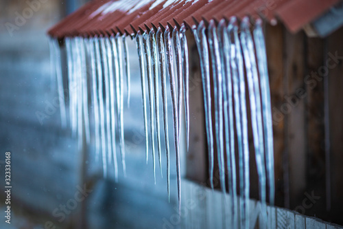 Icicles formed on a roof after the temperatures increased, melting the snow and decreased again © bdavid32