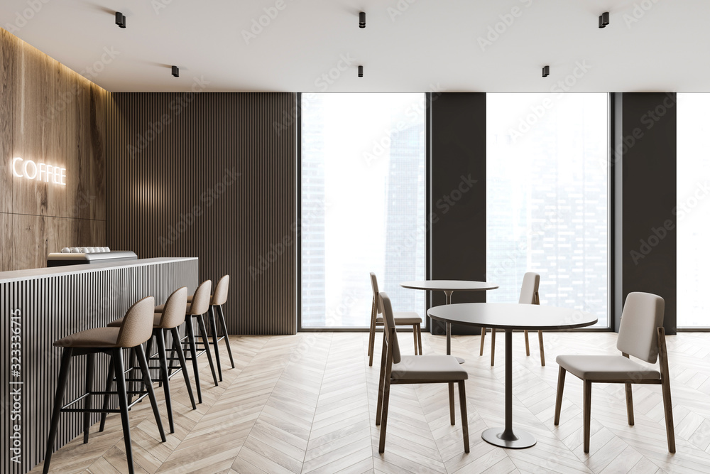 Modern coffee shop interior with bar and tables Modern coffee shop interior with bar and tables
