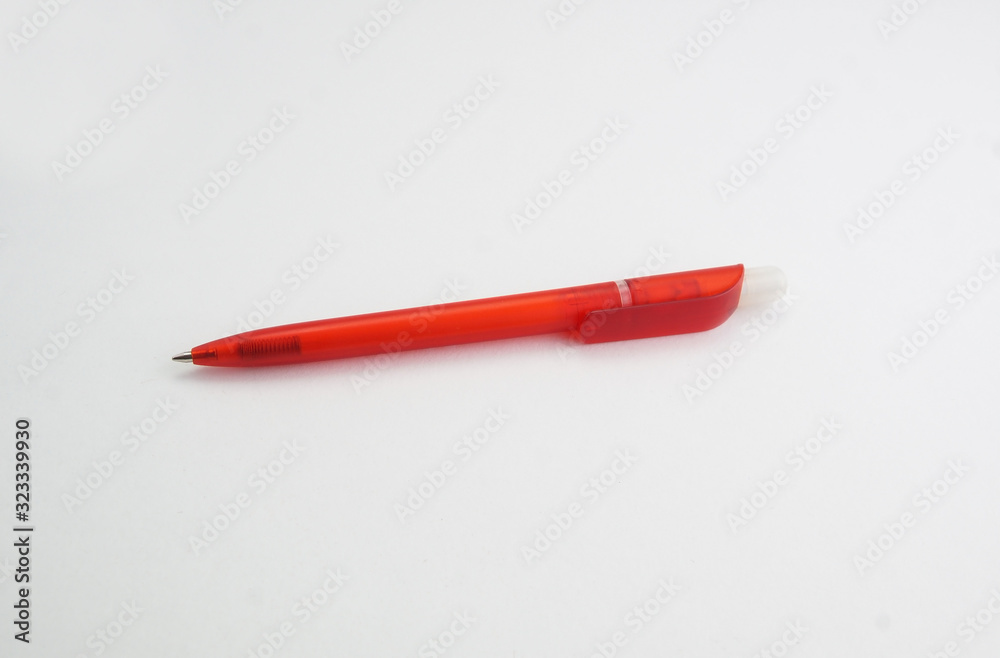 plastic red ballpoint pen on white background plastic red ballpoint pen on white background