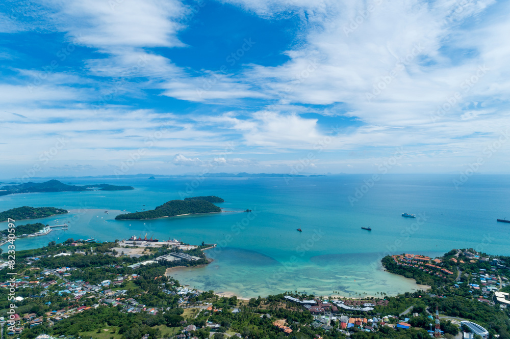 Aerial drone bird's eye view photo of tropical sea with Beautiful island at phuket thailand.
