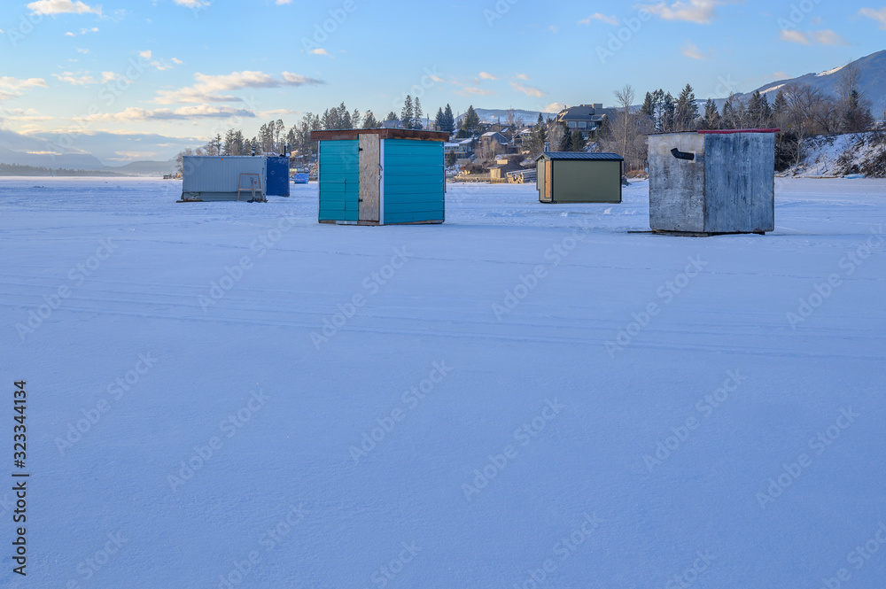 Ice fishing shacks on Lake Windermere at the town of Invermere, British Columbia, Canada Ice fishing shacks on Lake Windermere at the town of Invermere, British Columbia, Canada