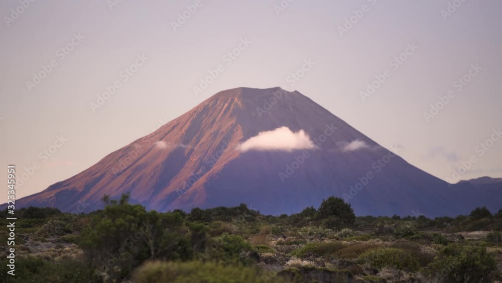 One beautiful cloud in front of Mount Ngauruhoe while sunset. Rangipo Desert. What a peaceful sight.