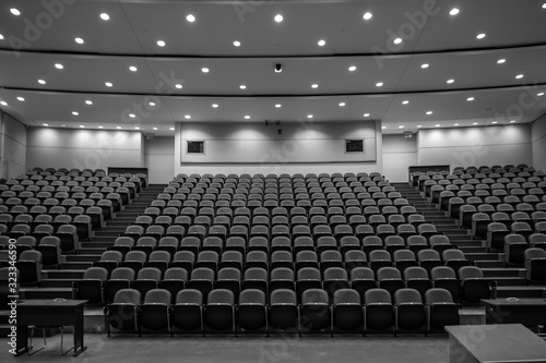 Back to School - Empty university lecture hall, black and white