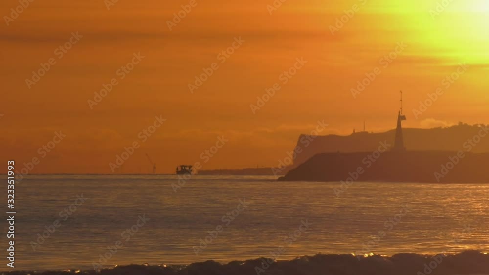 Small fishing boat silhouette at sunrise, mediterranean Small fishing boat silhouette at sunrise, mediterranean