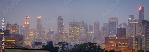 Photography Blurry city scape of public housing in central Singapore, light bokeh during blu