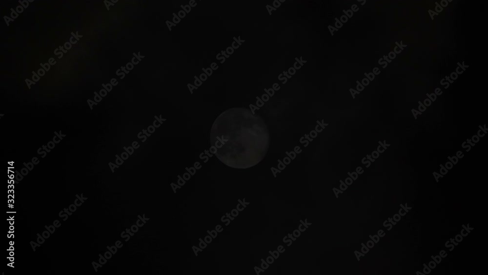 Full moon in the sky with clouds at night. Full moon in the sky with clouds at night.