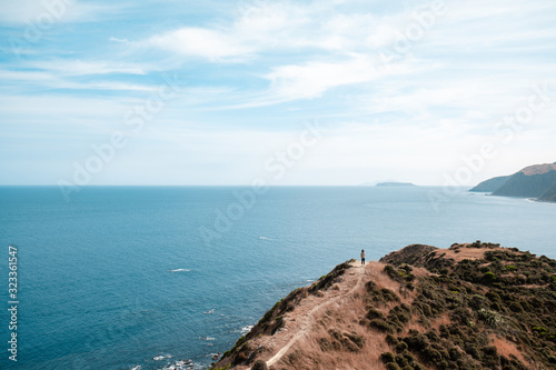 Woman hiking in New Zealand Wellington photo