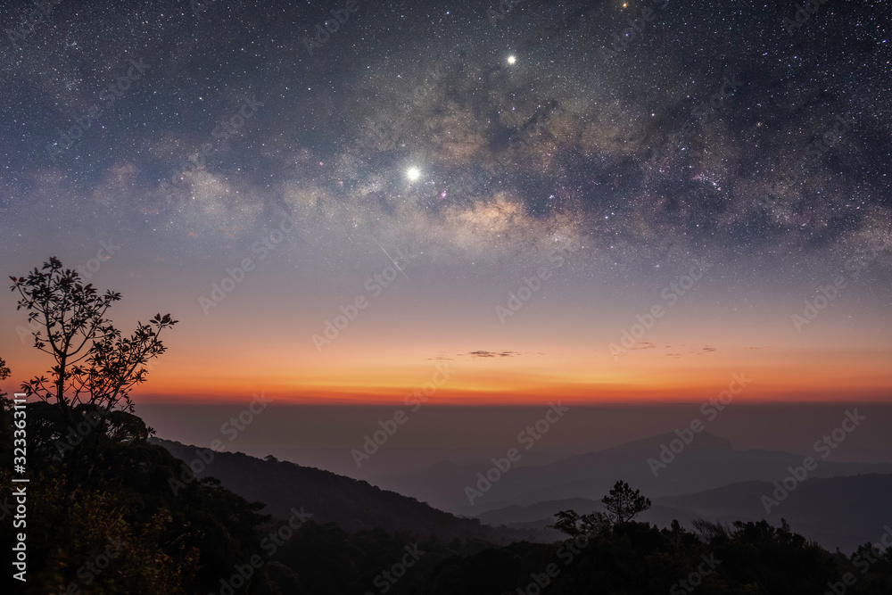 Fototapeta premium Observers at night have stars, milky way and galaxies filled the dark sky.