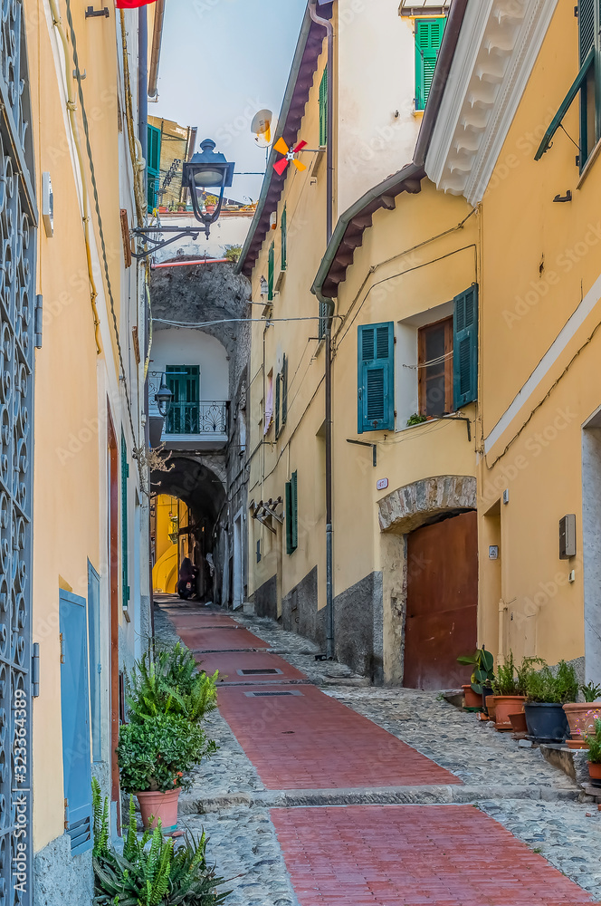 Fototapeta premium Colorful old buildings of a hilltop medieval town of Ventimiglia in Italy across from the French border